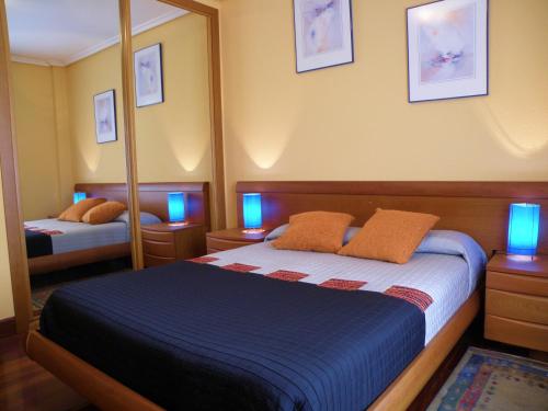 Katil atau katil-katil dalam bilik di Apartamento Rural Elizondo