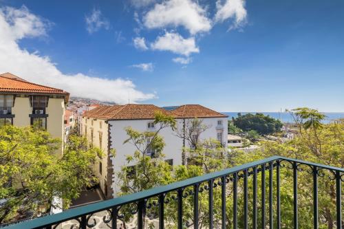 a view of a city from a balcony at Barceló Funchal Oldtown in Funchal