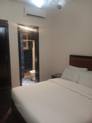 Ліжко або ліжка в номері Port Sharm Resort Apartment