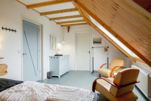 Posezení v ubytování Vakantiehuis De Dars - Callantsoog
