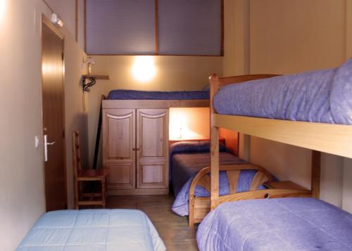 
A bunk bed or bunk beds in a room at Albergue Turístico Via de la Plata

