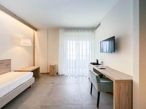 Letto o letti in una camera di Bellettini Hotel