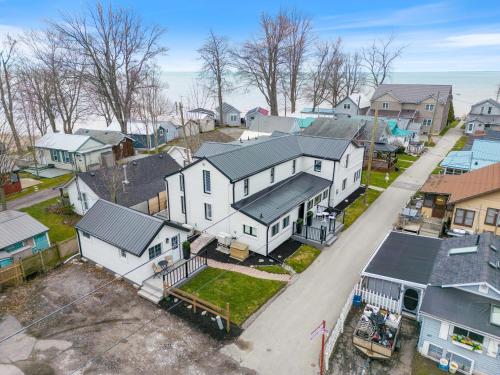 an aerial view of a residential neighborhood with houses at Luxe Lodges on Lake Erie in Port Dover