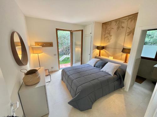 A bed or beds in a room at Cokkinis villa with garden overlooking the sea