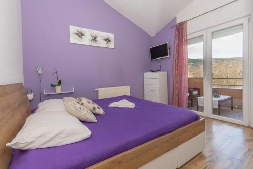 Postel nebo postele na pokoji v ubytování Villa Bravic