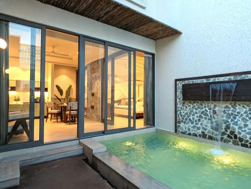 a swimming pool in a house at Cape House in Amritsar