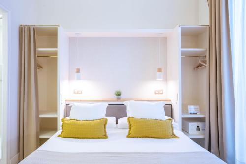 Posteľ alebo postele v izbe v ubytovaní Feelathome Casa Bertrand