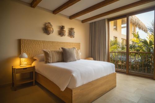 Hotel Aimarawaにあるベッド