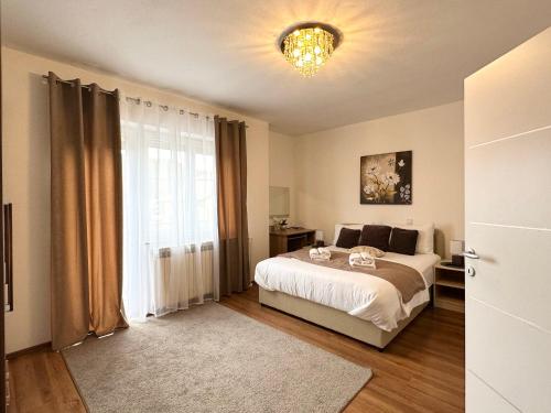 Posteľ alebo postele v izbe v ubytovaní Holiday house "Mimoza" 2 massage pools