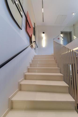 a staircase in a building with a stair case at Zalo Urban Living Spaces in Ioannina