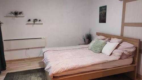 Postel nebo postele na pokoji v ubytování BuBu- Budapest Butterfly's