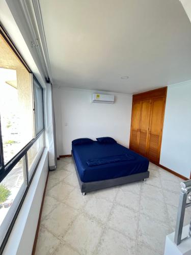 Vuode tai vuoteita majoituspaikassa El Peñon del Rodadero Apartamento Playa Rodadero 8