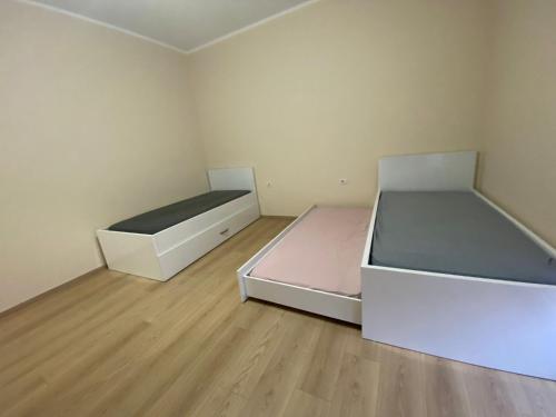 Postel nebo postele na pokoji v ubytování Apartament Jony
