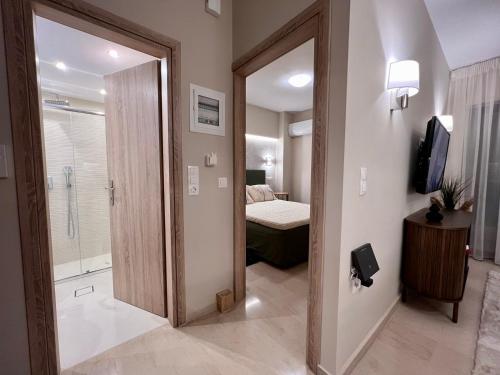 Postel nebo postele na pokoji v ubytování 'Amaryllis Home' ,το σπίτι σας