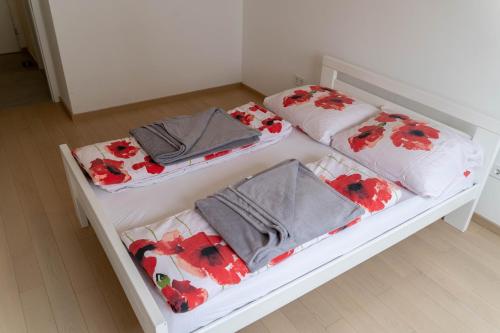 Katil atau katil-katil dalam bilik di Apartman SLOL