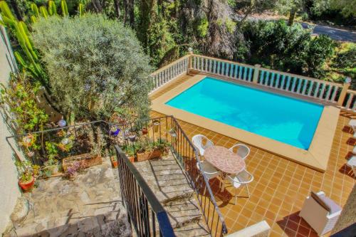 an overhead view of a swimming pool in a villa at Monica II - holiday home with private swimming pool in Benissa in Benissa