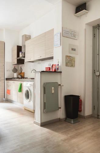 Kuchyň nebo kuchyňský kout v ubytování WhatsHouse Roma