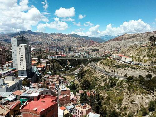 an aerial view of a city with mountains and buildings at Apartamento en La Paz in La Paz