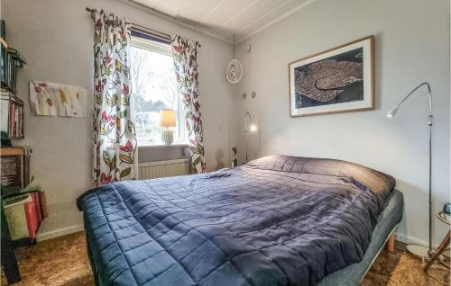 Tempat tidur dalam kamar di Stunning Home In Fagerfjll With Wifi