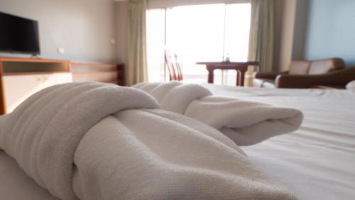 Postel nebo postele na pokoji v ubytování Peak by meroom