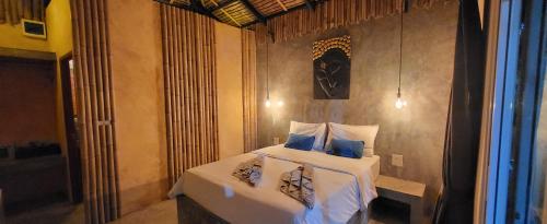 Ένα ή περισσότερα κρεβάτια σε δωμάτιο στο Asian Secret Resort
