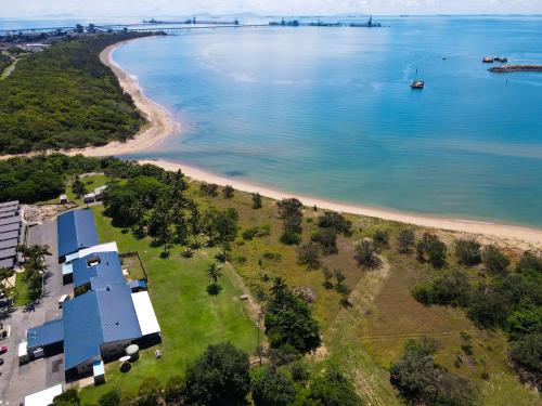 an aerial view of a beach with a blue building at Hay Point Hotel/Motel in Hay Point