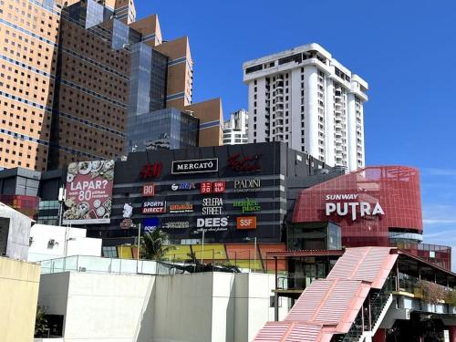 a group of tall buildings in a city at Charming apartment with Netflix at PWTC in Kuala Lumpur