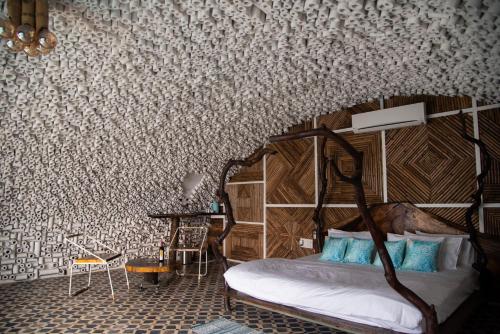 Ein Bett oder Betten in einem Zimmer der Unterkunft Obrigado by Craftels