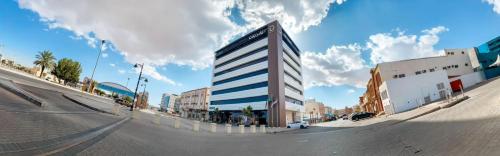 El barrio en el que está el hotel o un barrio cercano