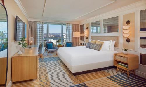 a hotel room with a bed and a desk at Viceroy Santa Monica in Los Angeles