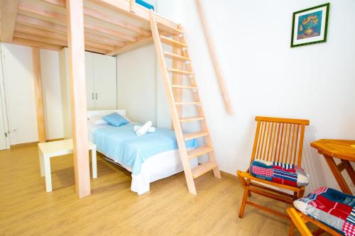 Krevet ili kreveti na sprat u jedinici u okviru objekta Garden Resort - Apartments Lavanda