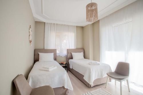 Postel nebo postele na pokoji v ubytování Furnished Cozy Flat with Wide Sea View in Kas