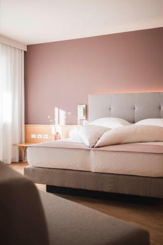Ένα ή περισσότερα κρεβάτια σε δωμάτιο στο Residence Hirzer