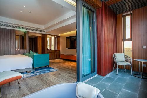 Ein Sitzbereich in der Unterkunft Gao Shi Di Hot Spring Hotel Yangzhou