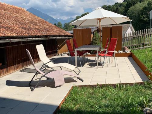 Κήπος έξω από το Charmantes Alpen-Appartement in Conters, Davos-Parsenn