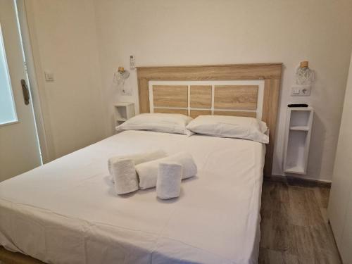 Posteľ alebo postele v izbe v ubytovaní O&L San Luis Feel at Home in a Renovated Apartment