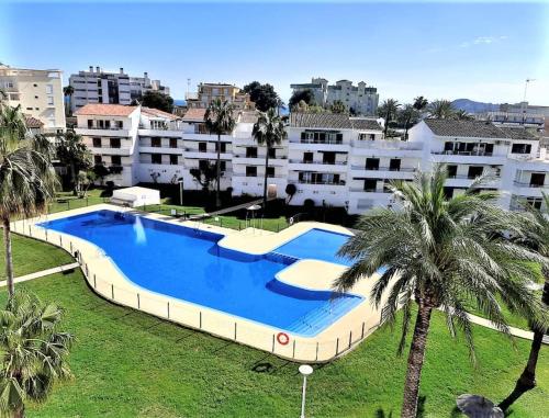 Bazén v ubytovaní Apartamento estilo Mediterráneo. Segundo Montañar. alebo v jeho blízkosti