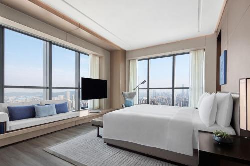 Postel nebo postele na pokoji v ubytování JW Marriott Hotel Changsha