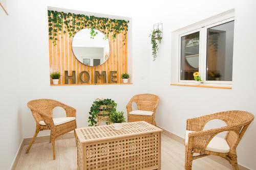 a room with a table and chairs and a mirror at Los Alonsos - Open Mall - By AZ Rentals in Arrecife