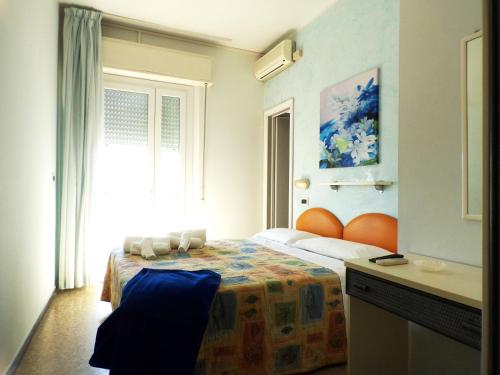 Katil atau katil-katil dalam bilik di Hotel Crystal - SPIAGGIA INCLUSA con pacchetti personalizzati