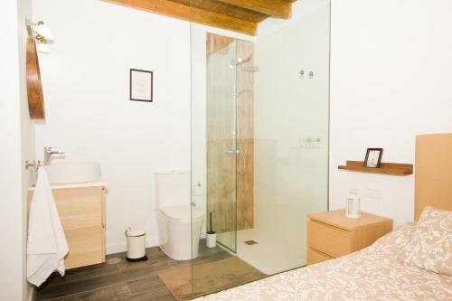 a bathroom with a shower and a toilet and a sink at Los Alonsos - Open Mall - By AZ Rentals in Arrecife