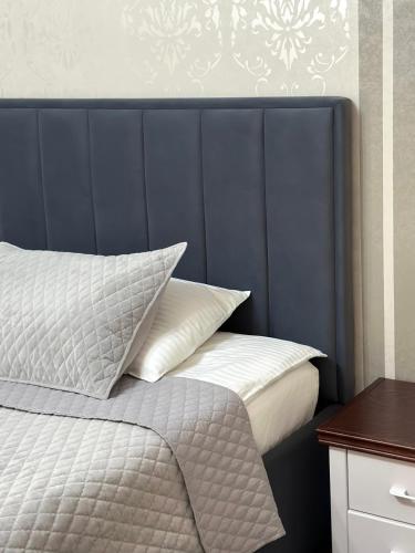 Letto o letti in una camera di Villa ACAEM
