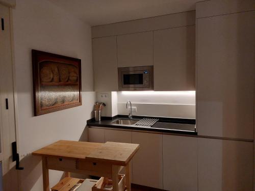 A kitchen or kitchenette at bt6gallos