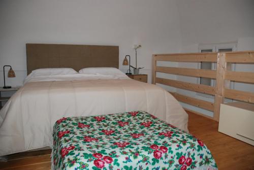 En eller flere senge i et værelse på Casa Vacanze Totò Sapore