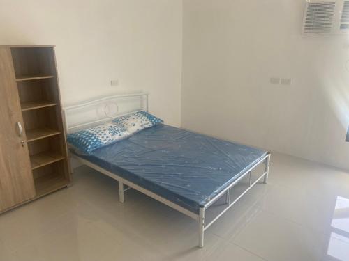 Postel nebo postele na pokoji v ubytování Ziem Rooms Cebu