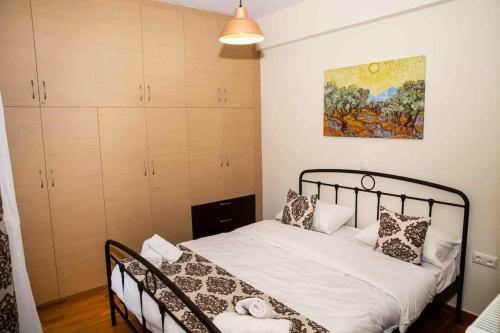 Katil atau katil-katil dalam bilik di Lavrio Olympic Marine Seaview 2bdr Apt