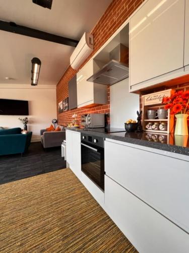 Η κουζίνα ή μικρή κουζίνα στο Withers Farm Apartments