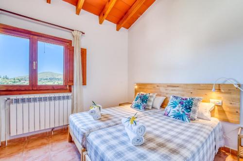 Ένα ή περισσότερα κρεβάτια σε δωμάτιο στο Ideal Property Mallorca - Sementaret