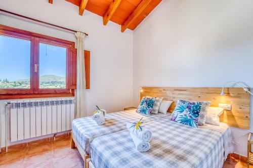 Katil atau katil-katil dalam bilik di Ideal Property Mallorca - Sementaret
