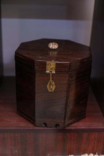 a wooden chest sitting on top of a table at NALINAM HOMESTAY in Trivandrum